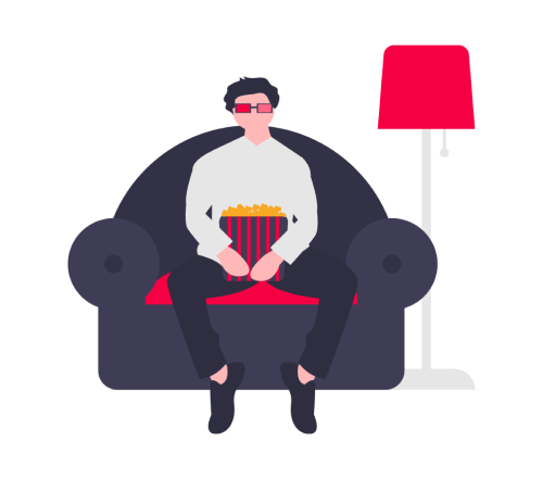 Man on couch with popcorn